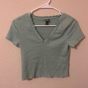 green crop top